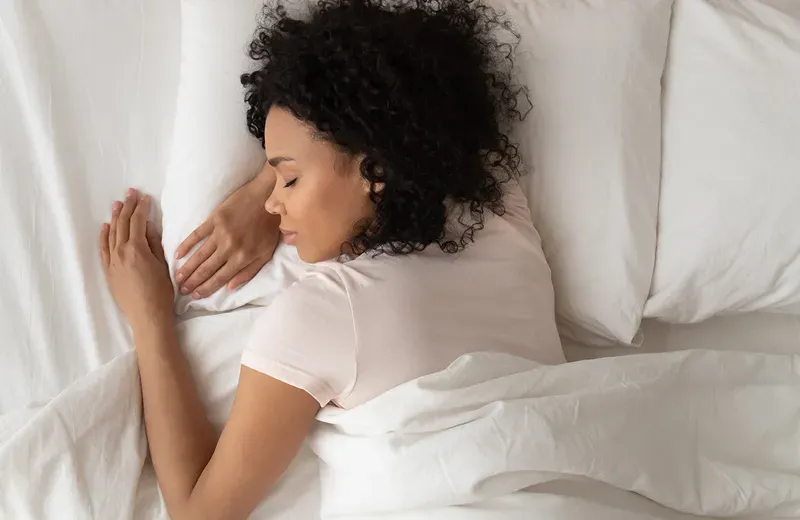 woman sleeping in bed bug free bed
